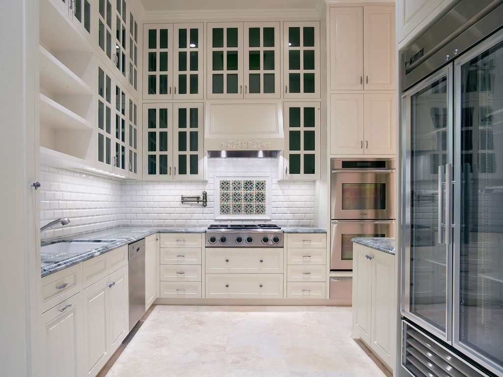 Large kitchen with glass cabinets